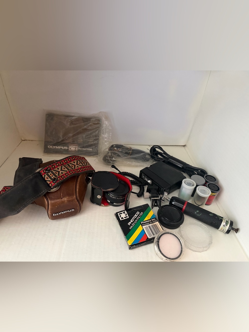 Olympus OM 1 SLR film camera with Original Leather  Case and Accessories